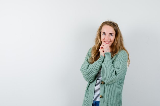 Expressive young woman posing in the studio