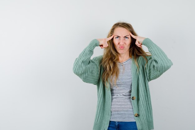 Expressive young woman posing in the studio