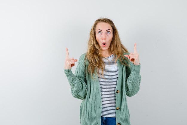 Expressive young woman posing in the studio