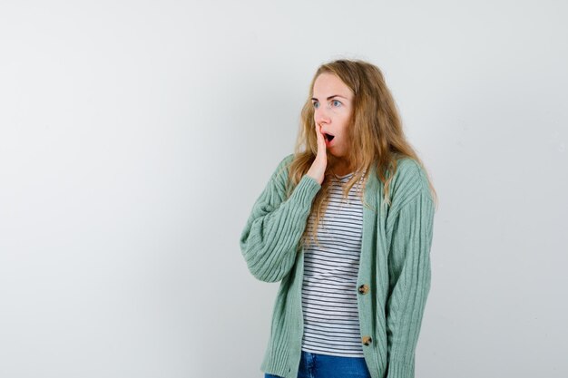 Expressive young woman posing in the studio