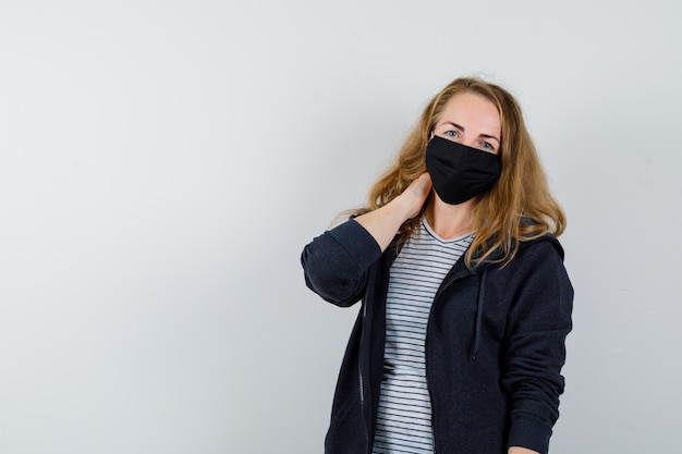 Expressive young woman posing in the studio