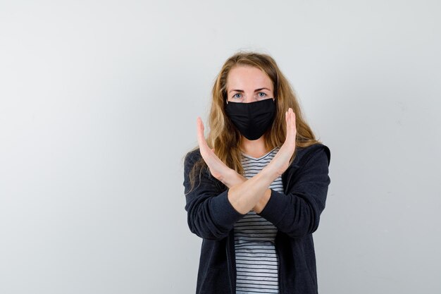 Expressive young woman posing in the studio