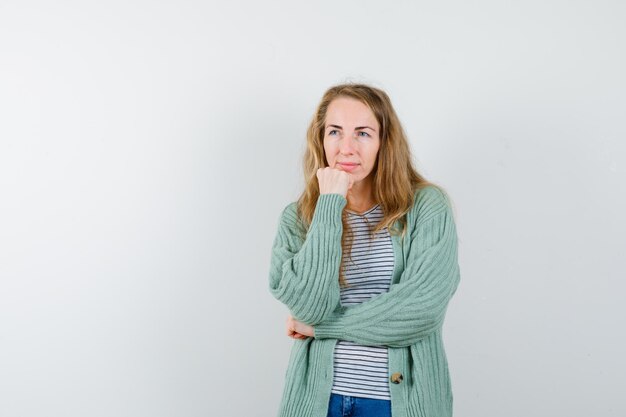 Expressive young woman posing in the studio