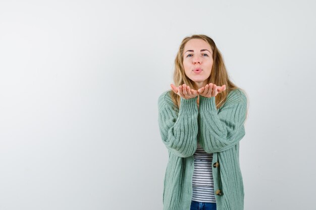 Expressive young woman posing in the studio