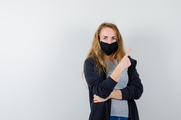 Expressive young woman posing in the studio