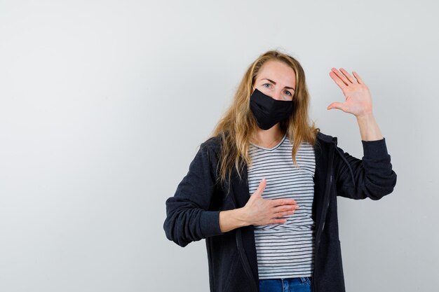 Expressive young woman posing in the studio