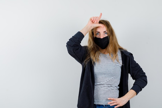 Expressive young woman posing in the studio