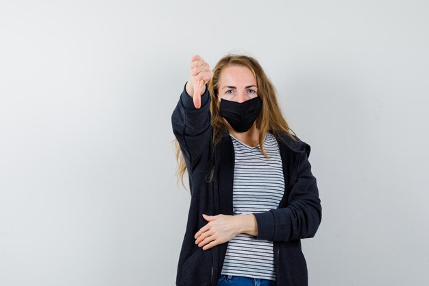 Expressive young woman posing in the studio