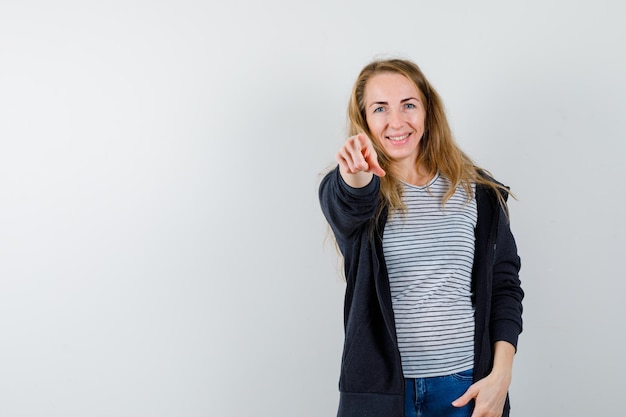 Expressive young woman posing in the studio