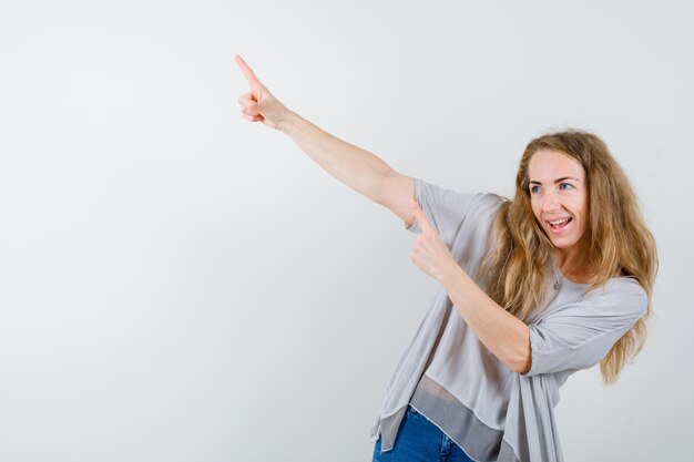 Expressive young woman posing in the studio