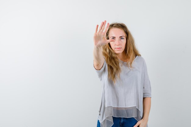 Expressive young woman posing in the studio