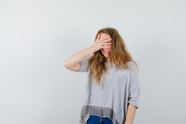 Expressive young woman posing in the studio