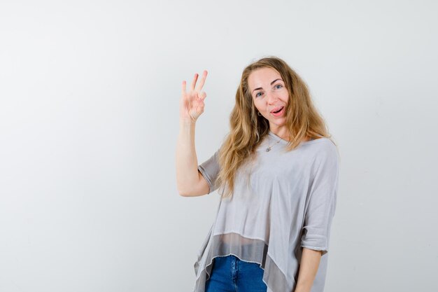 Expressive young woman posing in the studio