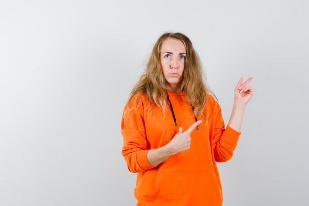 Expressive young woman posing in the studio