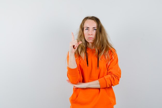 Expressive young woman posing in the studio