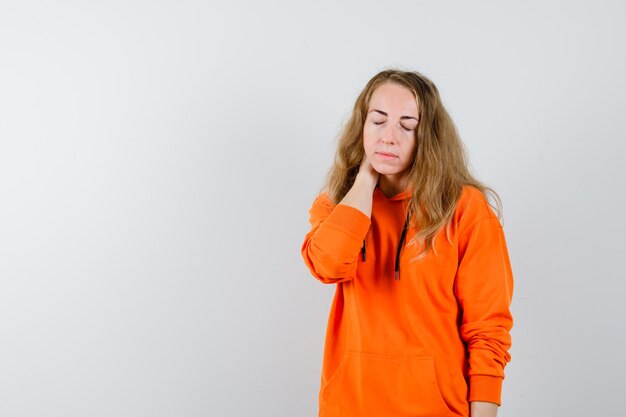 Expressive young woman posing in the studio