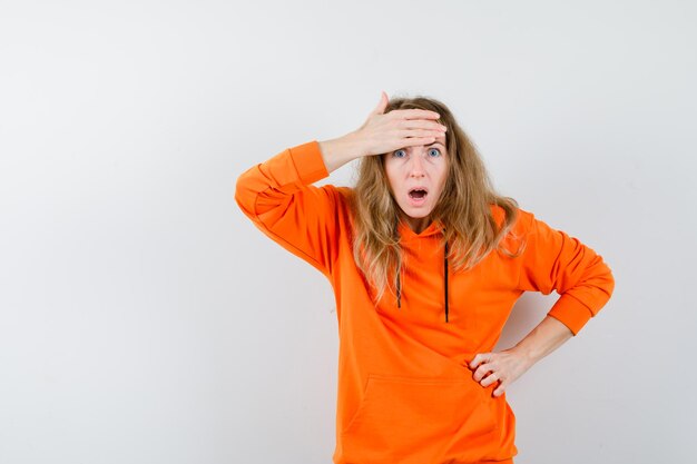 Expressive young woman posing in the studio