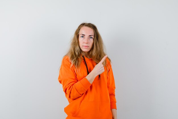 Expressive young woman posing in the studio