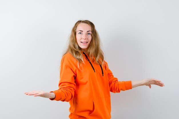 Expressive young woman posing in the studio