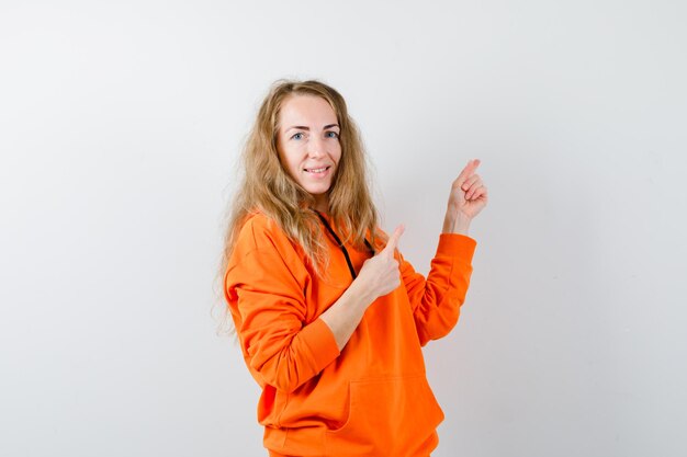 Expressive young woman posing in the studio