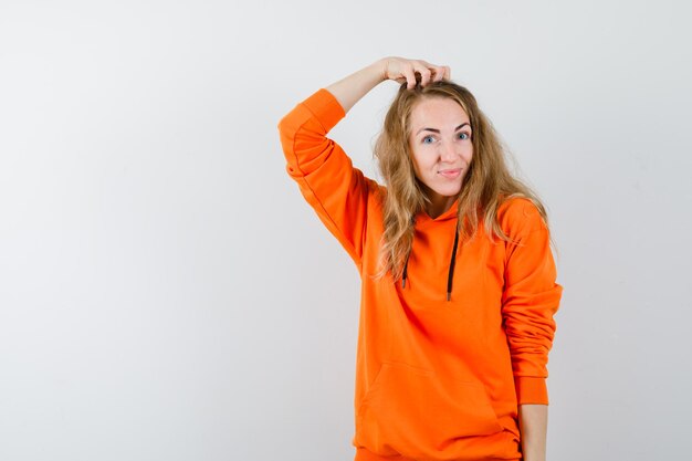 Expressive young woman posing in the studio