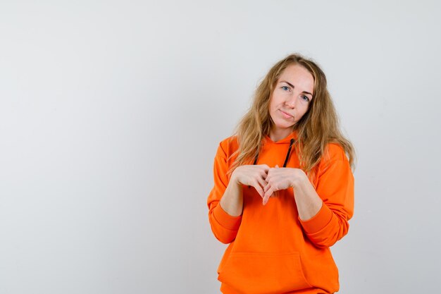 Expressive young woman posing in the studio