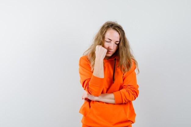 Expressive young woman posing in the studio