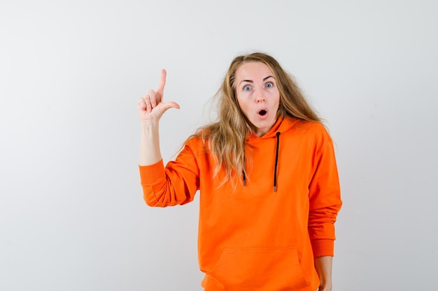 Expressive young woman posing in the studio