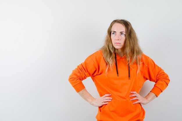 Expressive young woman posing in the studio