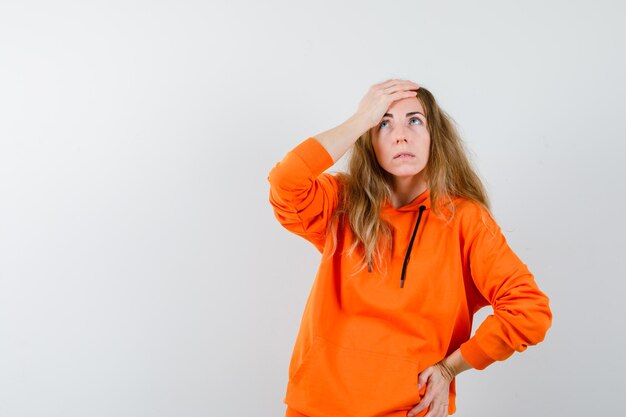 Expressive young woman posing in the studio