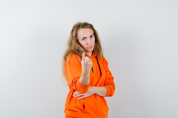 Expressive young woman posing in the studio