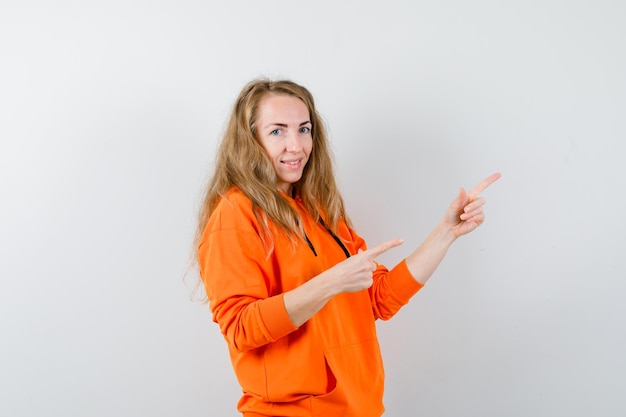 Expressive young woman posing in the studio