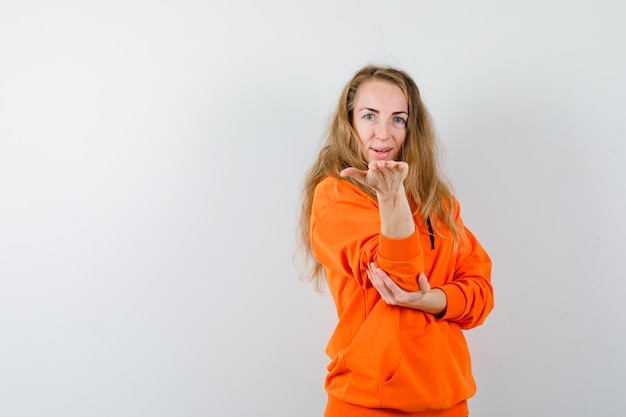 Expressive young woman posing in the studio