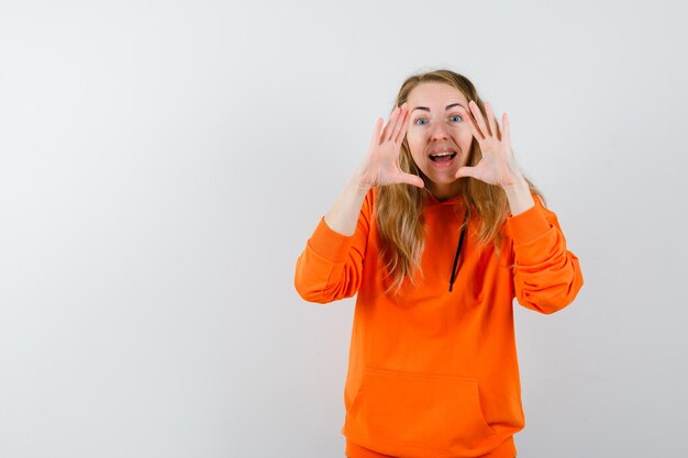 Expressive young woman posing in the studio