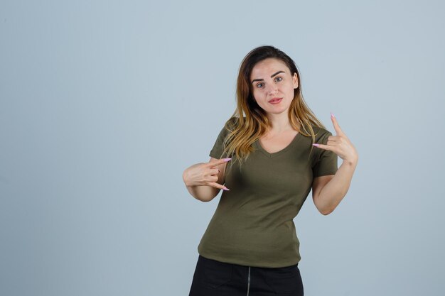 Expressive young woman posing in the studio