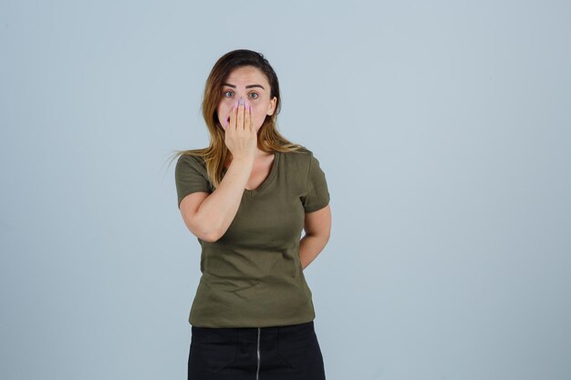 Expressive young woman posing in the studio