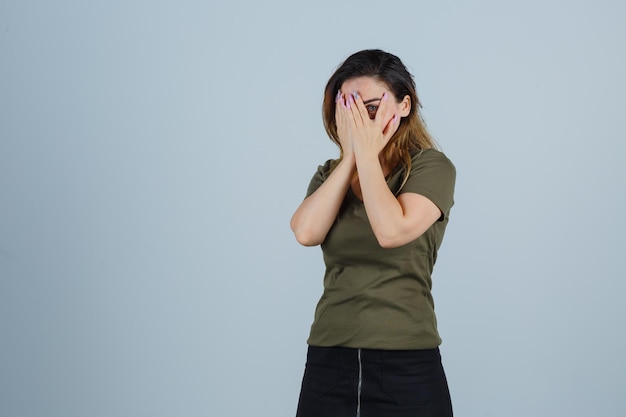 Expressive young woman posing in the studio