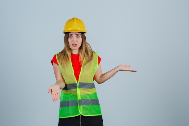 Expressive young woman posing in the studio