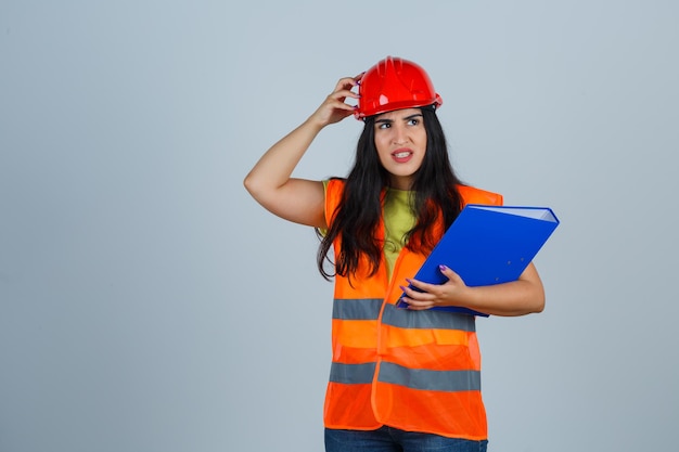 Expressive young woman posing in the studio