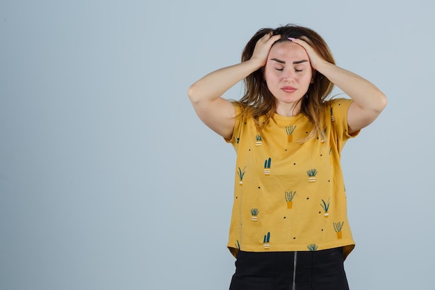 Expressive young woman posing in the studio