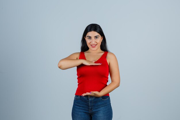 Expressive young woman posing in the studio