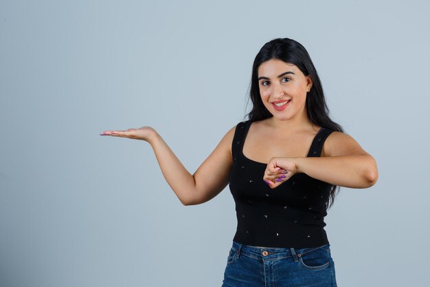 Expressive young woman posing in the studio