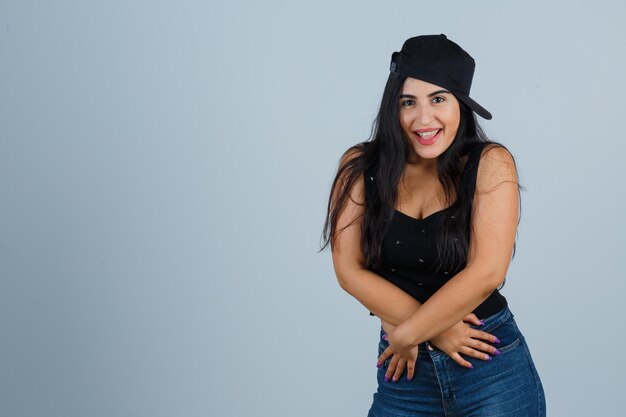 Expressive young woman posing in the studio