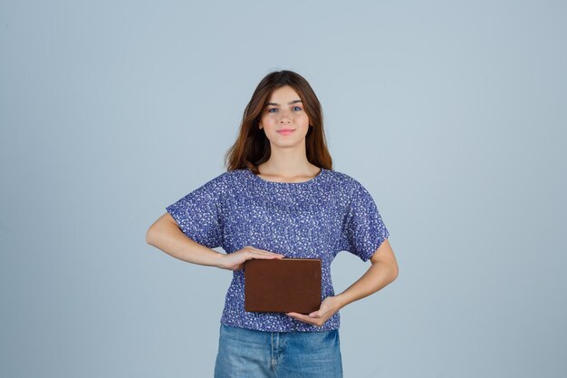 Expressive young woman posing in the studio