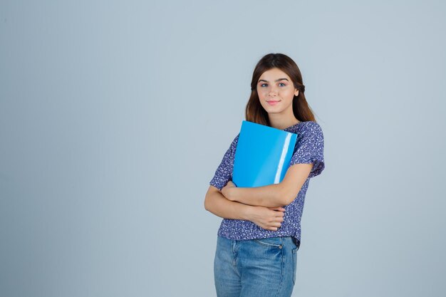 Expressive young woman posing in the studio