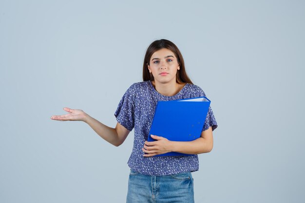 Expressive young woman posing in the studio