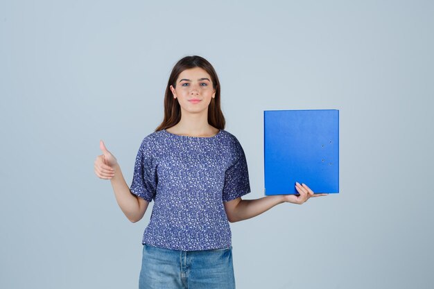 Expressive young woman posing in the studio