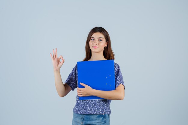 Expressive young woman posing in the studio