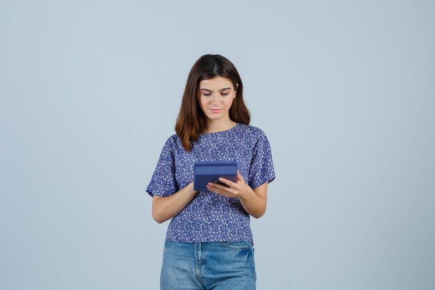 Expressive young woman posing in the studio