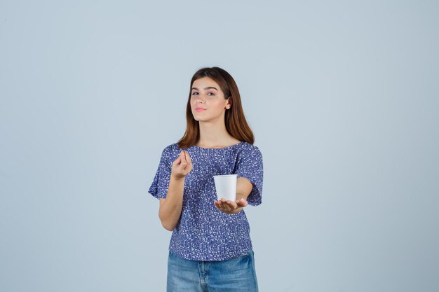 Expressive young woman posing in the studio